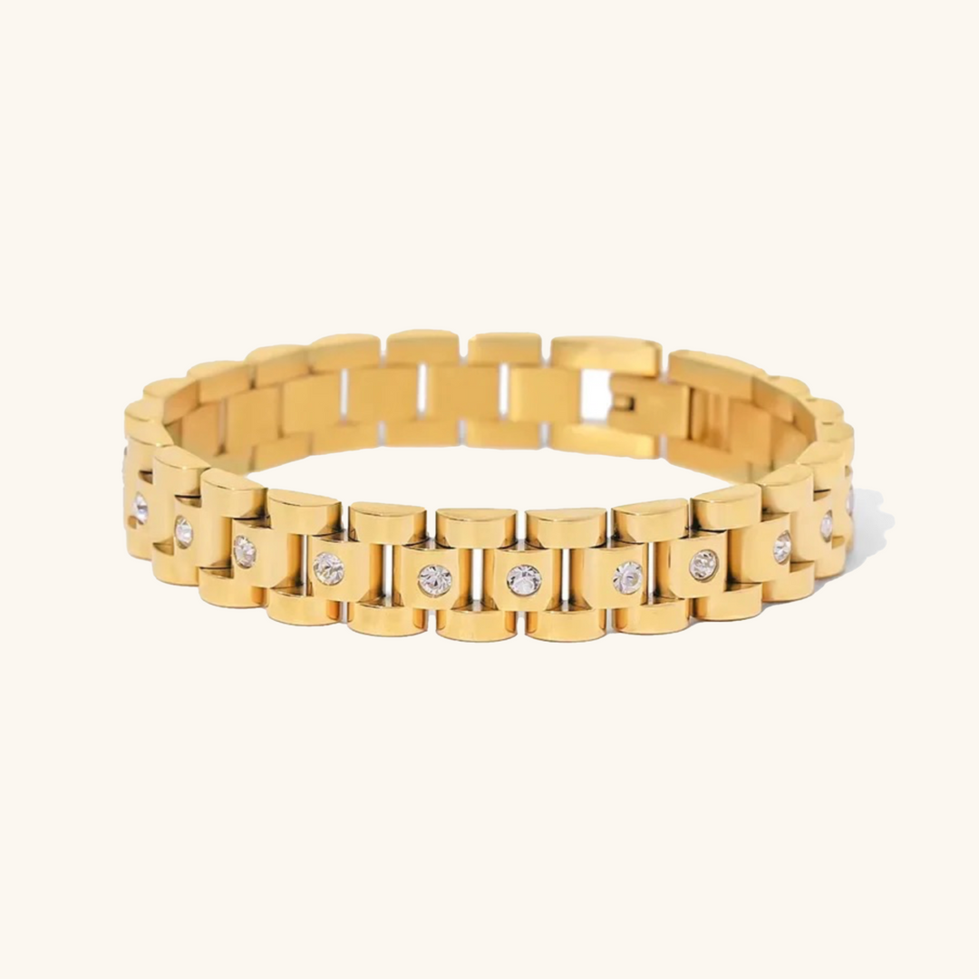 Amira – Bracelet doré avec une épaisse structure de chaîne.